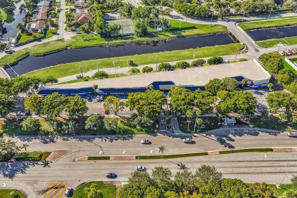 Photo of 7204 W Oakland Park Blvd, Lauderhill, FL 33313 (MLS # A12059343)