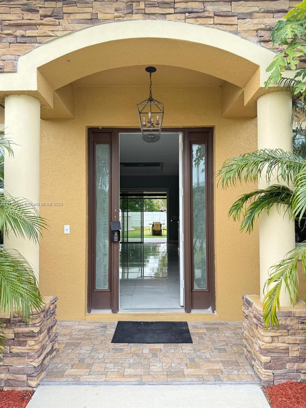 Photo of 6215 NW West Deville Cir, Port Saint Lucie, FL 34986 (MLS # A11764865)