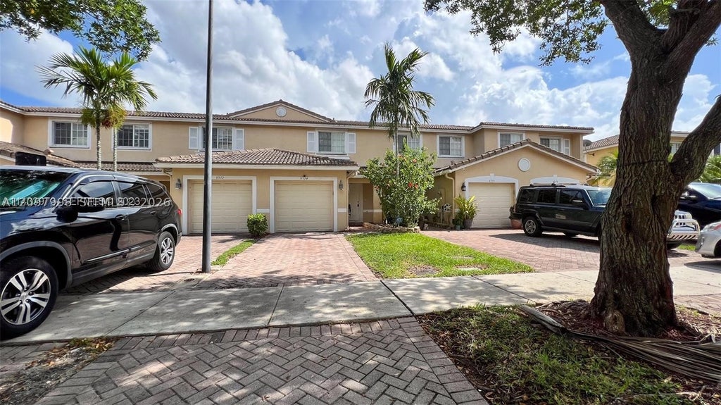 Photo of 8974 Lancaster St, Tamarac, FL 33321 (MLS # A12097998)
