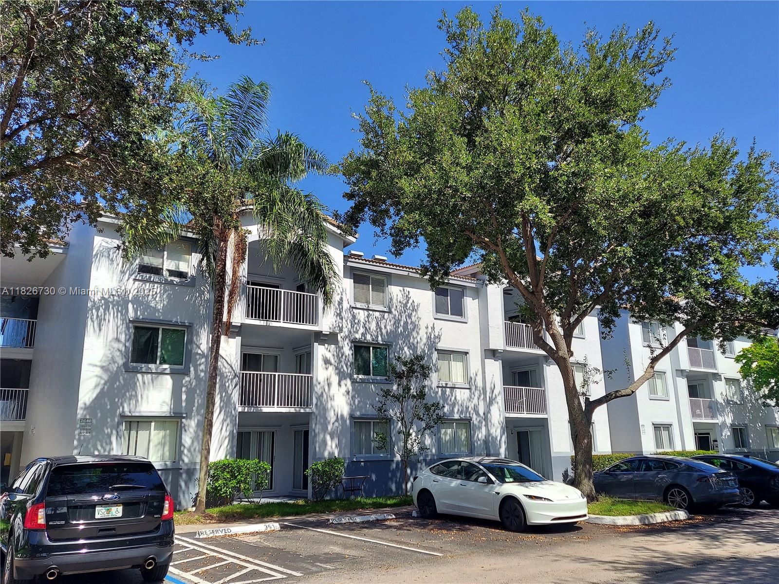 Step into this warm & inviting first-floor corner condo, featuring a functional 2 bed/2 bath split floor-plan, a kitchen that opens up to a living area flooded with natural light thanks to a private balcony, accessible also from the spacious bedrooms with large closet spaces, a new full-size washer/dryer, one assigned parking space. Pet friendly building, up to 2 pets & 50 lbs, and amenities including Pool, Gym, Club House, Basketball & Tennis Courts. Ongoing improvements in the community to enhance the aesthetic appeal and the safety and accessibility. Nestled in a prime location in high demand, near NSU colleges & A+ schools, major highways, shopping, restaurants, and hospitals, provides an excellent investment opportunity. Can lease right away for periods not less than 1 year!
