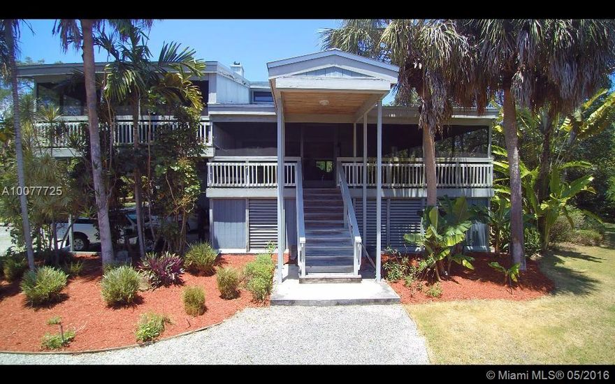 Beautiful Key West style energy efficient home nestled in lovely Pinecrest. Just minutes away from US1 and all major attractions, this home is built on a 38,000 sqft lot with 4,175 interior living area. Time stands still as you lounge on the wraparound porch in your own private oasis. Home is of wood frame construction with a metal roof. This is a regular sale, property is owned free and clear.
