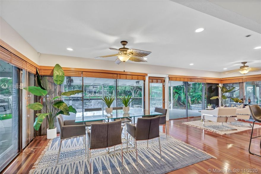 This point lot retreat in Citrus Isles offers you the adventure-filled waterside lifestyle you have been dreaming about: over 100’ of waterfront directly on the New River with no fixed bridges and easy ocean access. Fantastic outdoor living spaces for large scale entertaining and relaxing poolside.  You will be mesmerized by the daily parade of luxury yachts at your back door. This invitingly remodeled home has on open kitchen and split bedroom layout. Each bedroom conveniently has its own attached bathroom plus a cabana bathroom for guests. Recent upgrades include kitchen renovation and bathrooms, hardwood floors, metal roof (2013), AC, dock/deck, outdoor kitchen, boat lift and so much more. Citrus Isles is a relaxed haven, yet only minutes to Las Olas, I95 and the airport.