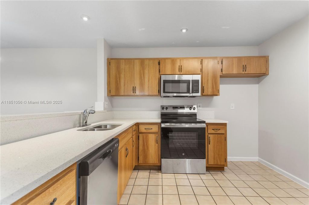 Photo of 1629 Woodbridge Lakes Cir, West Palm Beach, FL 33406 (MLS # A11851056)