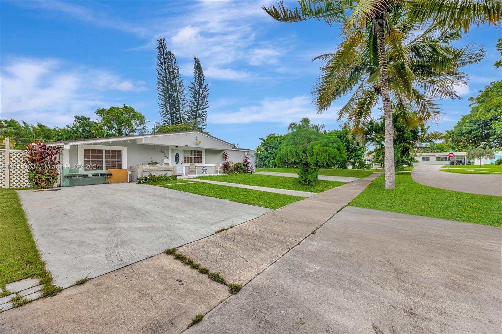 An outstanding opportunity for multi-generational living! This expansive property includes a 3-bedroom main house and 3 private guest suites, each opening to a peaceful covered lanai. The main home features a stunning pool with a waterfall, perfect for relaxation. Set on an oversized lot near major highways and shopping, this property is a true gem, offering space, convenience, and tranquility!