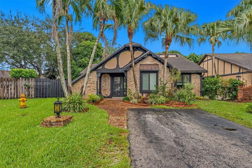 ASSUMABLE FHA LOAN at 5.75%! Take advantage of the existing mortgage and save on interest and origination fees Loan is 460K and can be assumed with the same terms - Ask me for details! Beautiful and spacious home with 3 bed 2 Bath PLUS 2 flexible spaces perfect for an office, den, or TV/Family room. Features Impact windows throughout  vaulted ceilings with exposed beams, an atrium filling the home with natural light, and elegant tile throughout. The gourmet kitchen includes granite countertops, custom cabinetry, and premium stainless steel appliances. Outside, enjoy a Chicago brick patio and a large fenced wraparound yard, ideal for entertaining. Located in a highly desirable neighborhood offering both privacy and convenience.