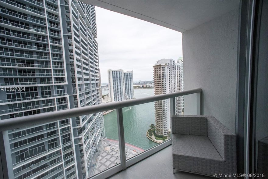 Must see this gorgeous upgraded unit at Icon Brickell, featuring porcelain floors throughout the entire unit, back splash in the kitchen and floor to ceiling accent tiles in bathroom. As well as interiors done for walking closet and Blackouts in Bedroom and Living area. Amazing views from this 29th floor without feeling dizzy from the extreme heights. Enjoy seeing the cruise ships at the Port of Miami, South Beach & the Atlantic Ocean. Philip Starck was the interior designer, he created the best amenities with the infinity pool facing Brickell Key. Best spa, plunge pools, state-of-the-art fitness center, saunas, steam rooms, game rooms, spinning room, movie theater, 3 restaurant in the premises and more. On site restaurants : Cantina La Veinte & Cipriani