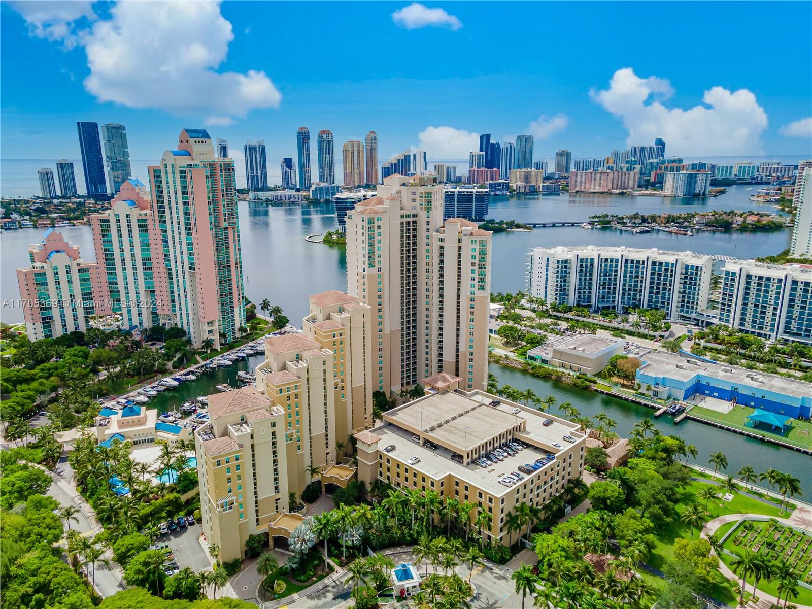 Welcome to this stunning 2-bedroom & 3-bathroom condo featuring a spacious den with stylish modern sliding doors. Enjoy breathtaking views of the pool, bay, and marina from the comfort of your home. This condo is situated in a secure gated community, conveniently located near Aventura Mall, Founders Park, shopping, and dining options, with direct access to the Intracoastal Waterway. The community offers fantastic amenities, including multiple pools, a clubhouse, marina, spa, fitness center, and much more. Don’t miss out on this incredible opportunity—call us today!