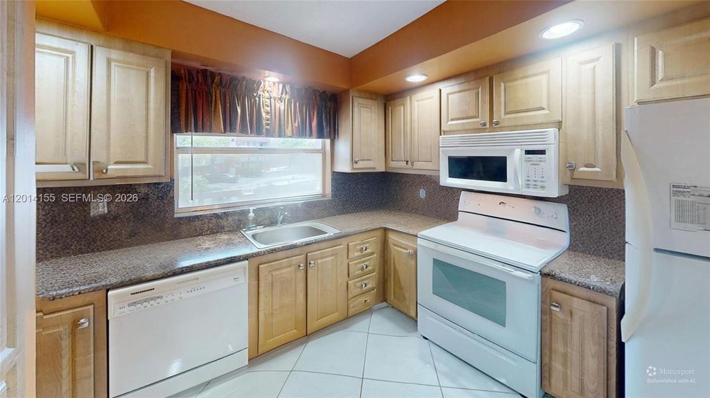 Photo of 9541 Sunrise Lakes Blvd #204, Sunrise, FL 33322 (MLS # A12014155)