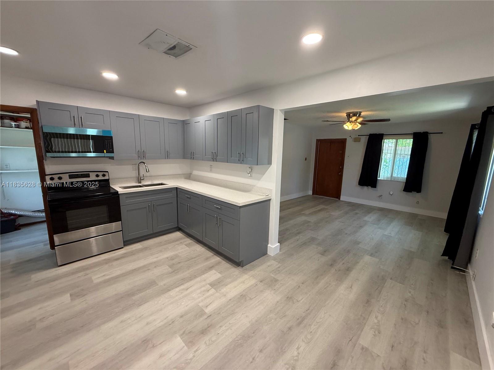 Spacious 2 bedroom, 2 bathroom with updated kitchen and primary bathroom, vinyl flank flooring, full size washer & dryer and IMPACT windows. Plenty of parking and fenced yard. Fantastic location east of US-1 just minutes from Hollywood Beach, Fort Lauderdale/Hollywood Airport, and downtown Hollywood & Fort Lauderdale.