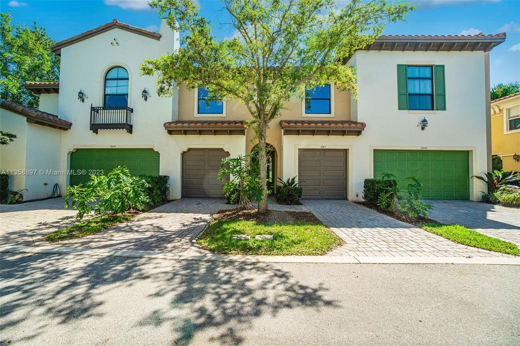 Photo of 12430 NW 32nd Mnr, Sunrise, FL 33323 (MLS # A11358897)