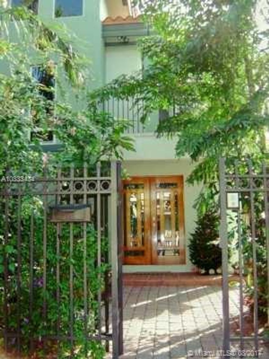 Situated 3 blocks from cocowalk in the best part of coconut grove, this 3200 SF townhouse is a gem at a great price.  Fabulous neighborhood, tons of restaurants and shops nearby, two parks within two blocks, and four blocks from the ocean. Large bedrooms with balconies, walk-in closets, Jacuzzi tub, custom maple cabinetry/ granite/stainless steel, marble and wood. Surround sound throughout with built in speakers, on-demand water heater.  One car garage, outdoor Jacuzzi, landscaping and sprinkler system, with Mosquito Misting System. Minutes to downtown, Gables, Beaches & Airport.