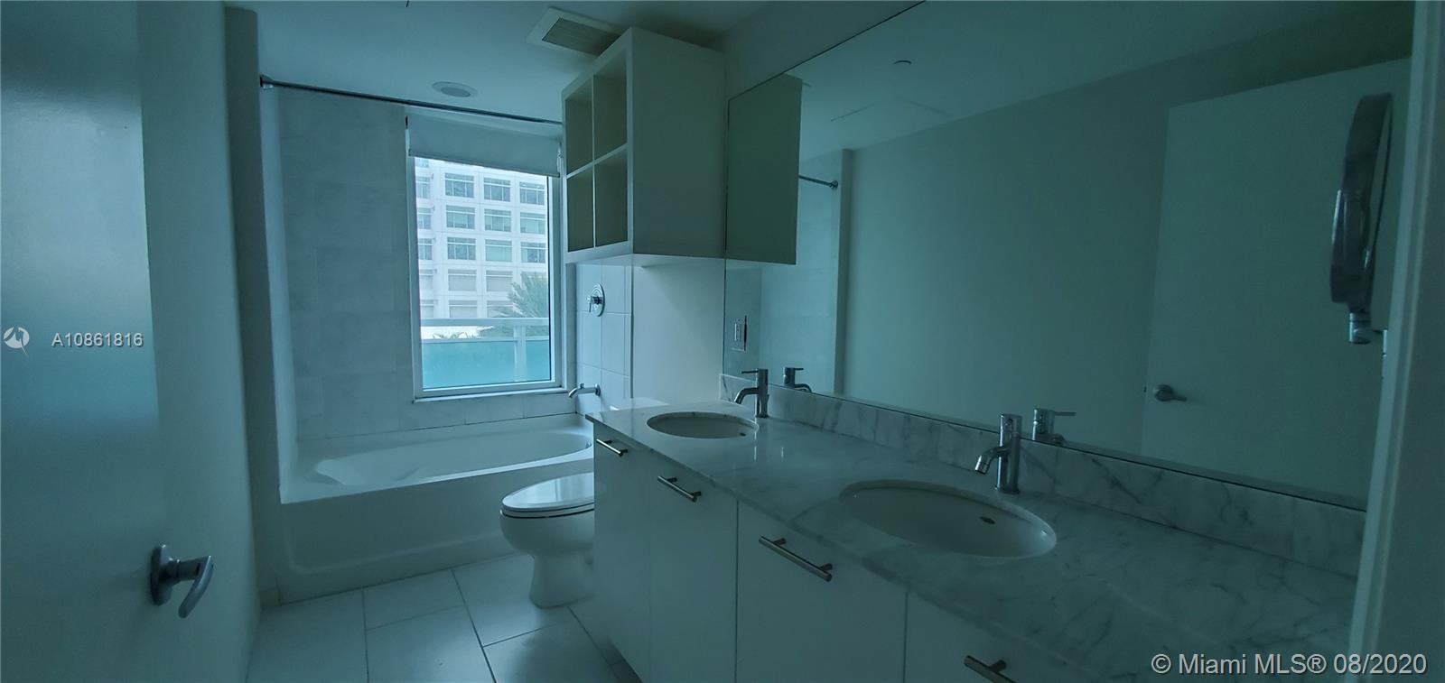 THE PLAZA 901 BRICKELL CO - Residential Lease