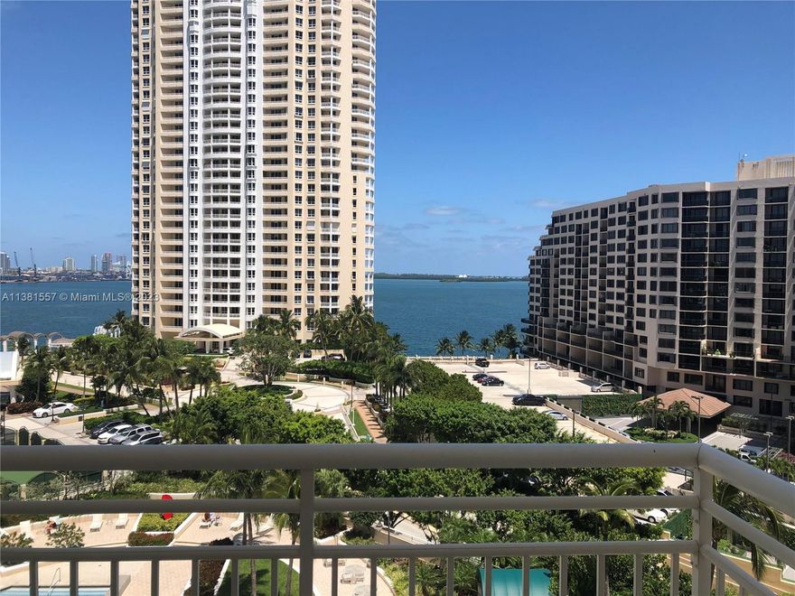Gorgeous 3 BR 3 BA residence with spectacular Bay and City Views!! One of a kind! Split bedroom floor plan offering a spacious living and dining area. Great size eat-in kitchen with balcony! Three en-suite bedrooms. Two assigned indoor parking spaces on 1st floor. Full-service building, gated, pool, spa, fitness center, racquetball court and much more! Brickell Key offers recreational parks, a 1-mile strolling path that surrounds the island, walk to restaurants and shops.