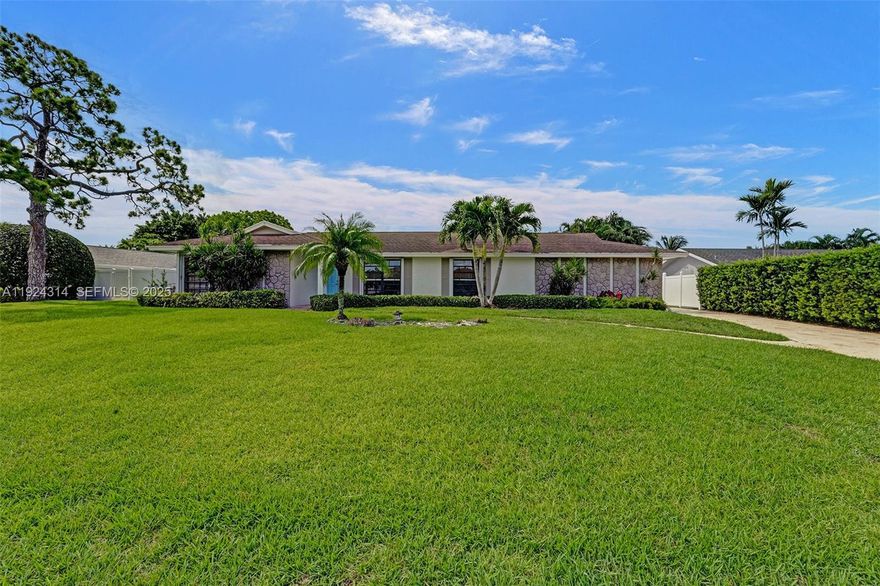 This stunning 3/2 single family home with NO HOA is well located in the highly exclusive neighborhood of Garden Isles in Palm Beach Gardens. NEW ROOF. Great open floor plan with large living space, Florida room and updated bathrooms. Oversized 2 car garage plus a long driveway that will hold up to 6 additional cars. 2022 A/C, 2021 pool pump and accordion shutters thought-out. The huge, fenced backyard with pool and waterfront property is perfect for entertaining. Excellent location within minutes of beaches, marinas, golf/tennis clubs, parks, restaurants, shopping and Palm Beach Int. Airport.