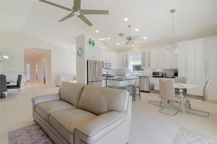 Welcome to a remodeled and spacious, light and bright 3/2 beautiful home, nestled on a large lot, with a spectacular lake view in the prestigious 55+ community of Baywinds. Step inside to discover an open floor plan with a stunning living area. The gourmet kitchen features custom-built cabinets, a granite countertop, and stainless-steel appliances. The primary suite includes expansive walk-in closets and a beautifully designed en-suite bathroom with dual sinks and a separate water closet for added comfort. This home also contains a new HVAC, a new water heater, and a recently renovated 2-car garage. Baywinds offers luxury resort-style living without extravagant country club fees. This home is an absolute must-see for anyone looking to experience the best of Florida living!