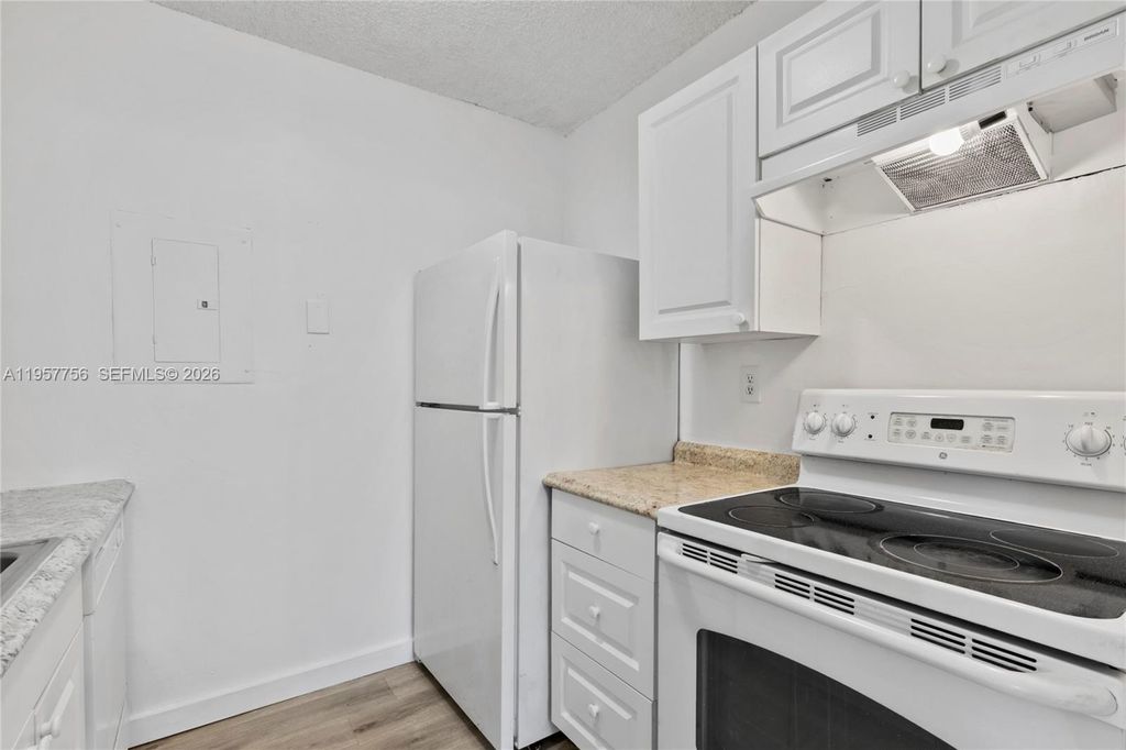 Photo of 1133 N Benoist Farms Rd #101, West Palm Beach, FL 33411 (MLS # A11957756)