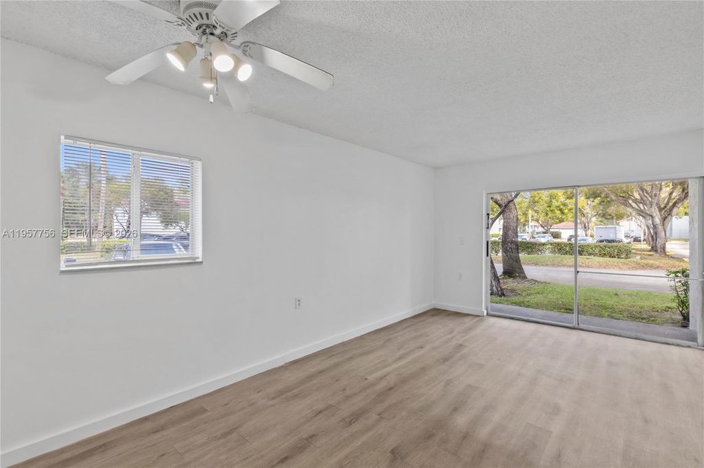 Photo of 1133 N Benoist Farms Rd #101, West Palm Beach, FL 33411 (MLS # A11957756)