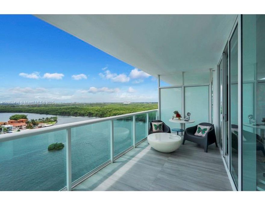 Stunning Intracoastal, Ocean, and Oleta Park views from the perfect floor! This bright 2-story unit features a spacious open layout with 3 bedrooms (den converted), 3 full bathrooms, large balcony, European cabinetry, and stainless steel appliances. 
Located at 400 Sunny Isles with top-tier amenities: infinity-edge pool, spa, fitness center, pool bar, gardens, and social areas. Just steps from the beach and minutes from Aventura Mall, Bal Harbour Shops, Oleta Park, and top dining. A must-see!