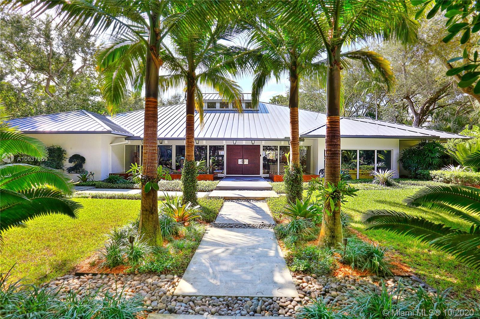 Come home to this gorgeous piece of art! Stunningly updated from top to bottom w/ the finest finishes & details like white oak wood floors throughout, architecturally designed water features at entrance, 1100 bottle wine cellar, Sonos sound system, Lutron lighting & power shades, outdoor liv rm including infinity edge pool, feature wall, summer kitchen w/ poured concrete counters, fireplace & cantilevered TUUCI umbrellas. Open living spaces w/ mahogany impact drs, gorgeous exposed beamed ceiling, gourmet kitchen w/ butler’s pantry, 3 BR’s down + game room, private 2nd floor master w/ beautiful double door entry offers gracious BR, sitting rm, stunning bath & 2 walk in closets. Laundry rm, 2 car gar, ½ basketball court, on cul de sac in soon to be gated community, Pinecrest elem & more!