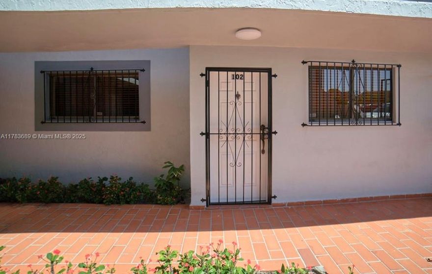 Cozy first floor Unit with spacious rooms remodeled kitchen and large balcony overlooking the Garden