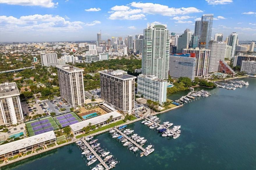 Best Location for this 1bed/1.5bath unit in a Bayfront building with resort style amenities. Unit has been tastefully remodeled with custom made Italian kitchen, SS Appliances, granite countertops, modern tile floors throughout, impact windows, new A/C unit, balcony with water views and Brickell skyline, W&D inside unit, 24 hr security, 6 tennis courts-pickle ball, marina, 2 pools, child play area, gym, common laundry and mini market. Live the Brickell lifestyle. Minutes to business district, best restaurants around, shops and entertainment, easy access to US1 and I95, beaches, hospitals, BCC and more...Hurry up, won't last! Renters insurance at walk-in.