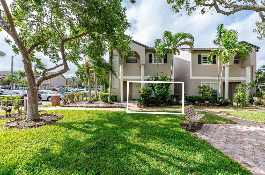 Photo of 3877 NW 122nd Ter #1-L, Sunrise, FL 33323 (MLS # A12050152)