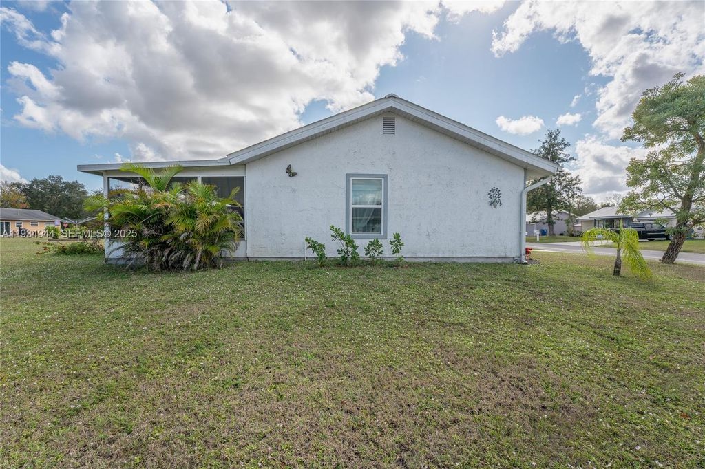 Photo of 2001 Schooner Dr, La Belle, FL 33935 (MLS # A11934944)