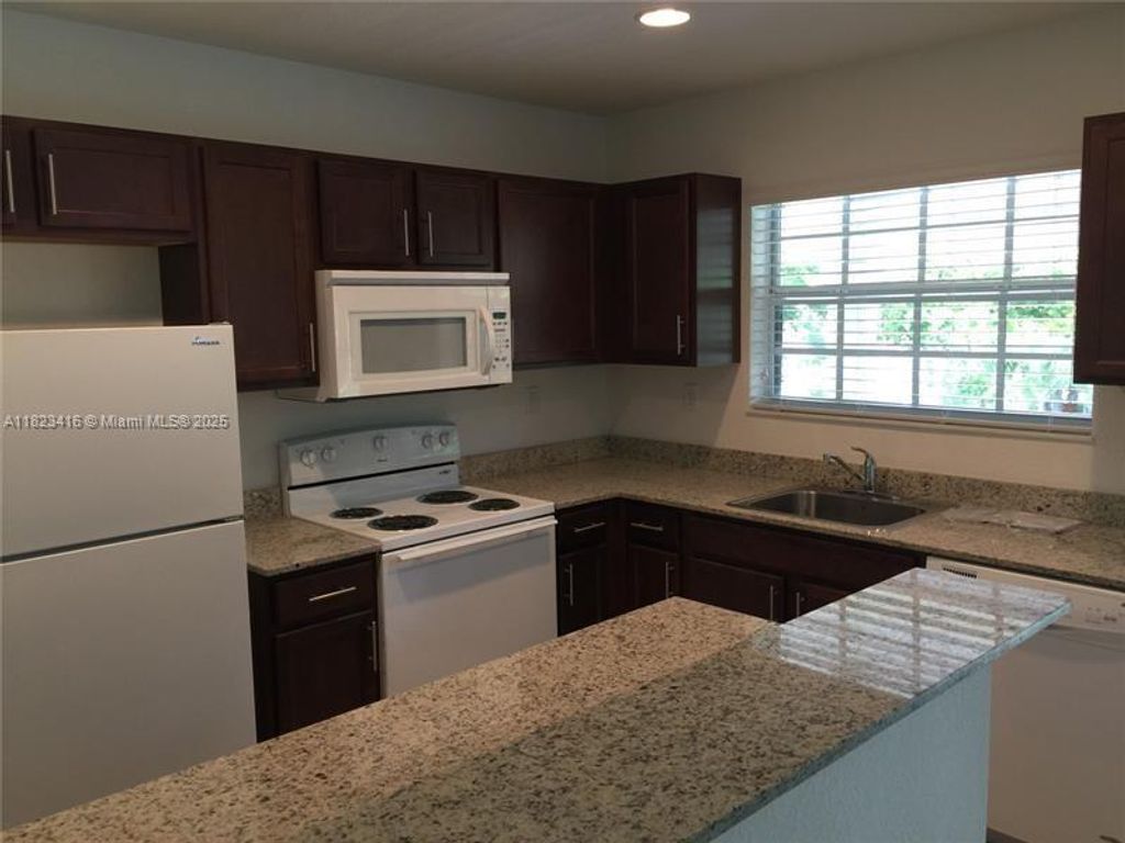 Photo of 3525 NW 114th Ln, Coral Springs, FL 33065 (MLS # A11823416)