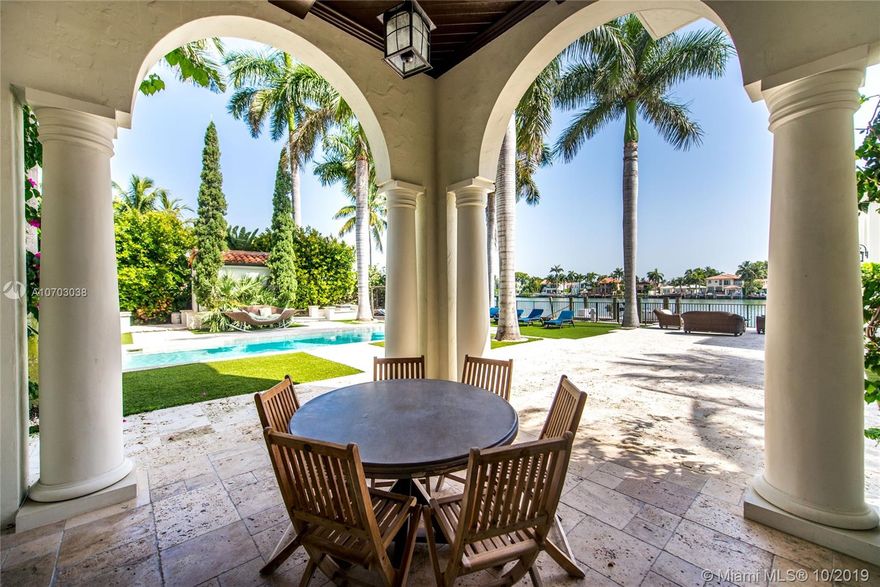 Exclusivity, fine design and bay breeze in Palm Island. Set on a spacious 30,000 SF lot and boasting 13,201 SF of living area, this 8 bedroom, 10/2 bathroom estate is the epitome of Miami Beach living. The Master Suite includes spacious his and hers bathrooms, his and hers closets and a private terrace overlooking the bay. Enjoy waterfront views from every room including the kitchen, family room and formal living room. Entertain indoors in the expansive formal dining room, outside in the central courtyard or by the bay and infinity pool. A private dock with 100 Feet of frontage completes this magnificent estate situated minutes from S Beach, Downtown & the Miami International Airport.