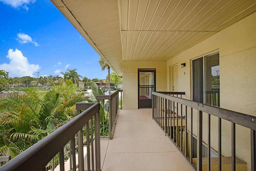 Photo of 6568 Chasewood Dr #E, Jupiter, FL 33458 (MLS # A11834400)