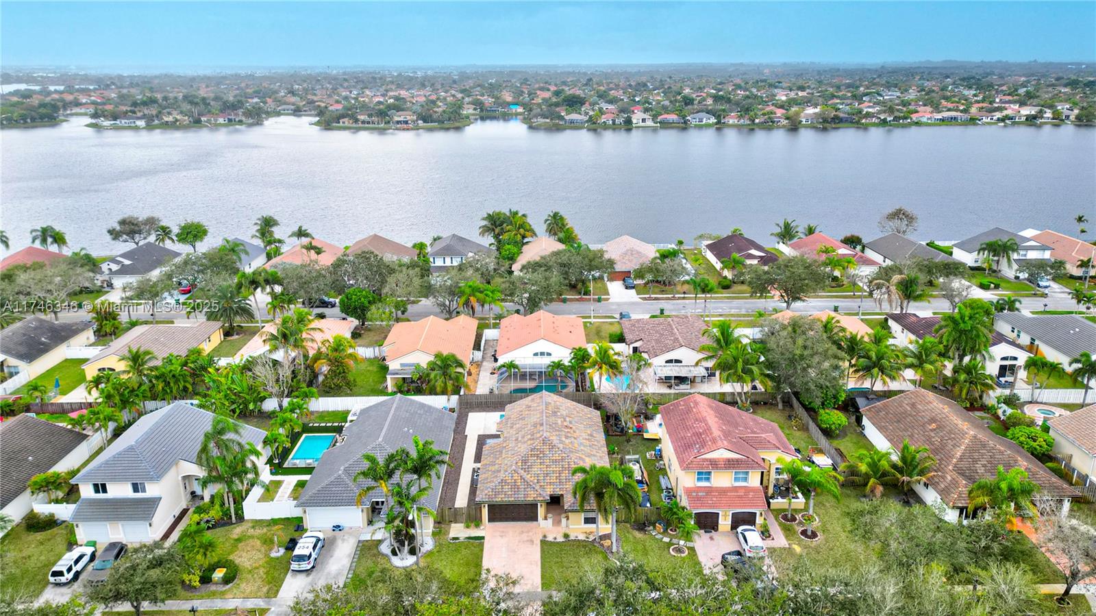 Nestled in a charming and picturesque gated community, this beautiful home offers 3 bedrooms, 2 bathrooms, and a spacious two-car garage. Enjoy the large pool and the privacy of this lovely property, ideally located in the heart of Pembroke Pines. Inside, you'll find tile flooring throughout, an open kitchen with a snack counter, and a cozy dining area. The home also features a brand-new roof. Conveniently close to shopping, top-rated schools, and more, this home is a must-see. The association fee includes basic cable and internet. Don’t miss out on this exceptional opportunity! Make offers seller- motivated.