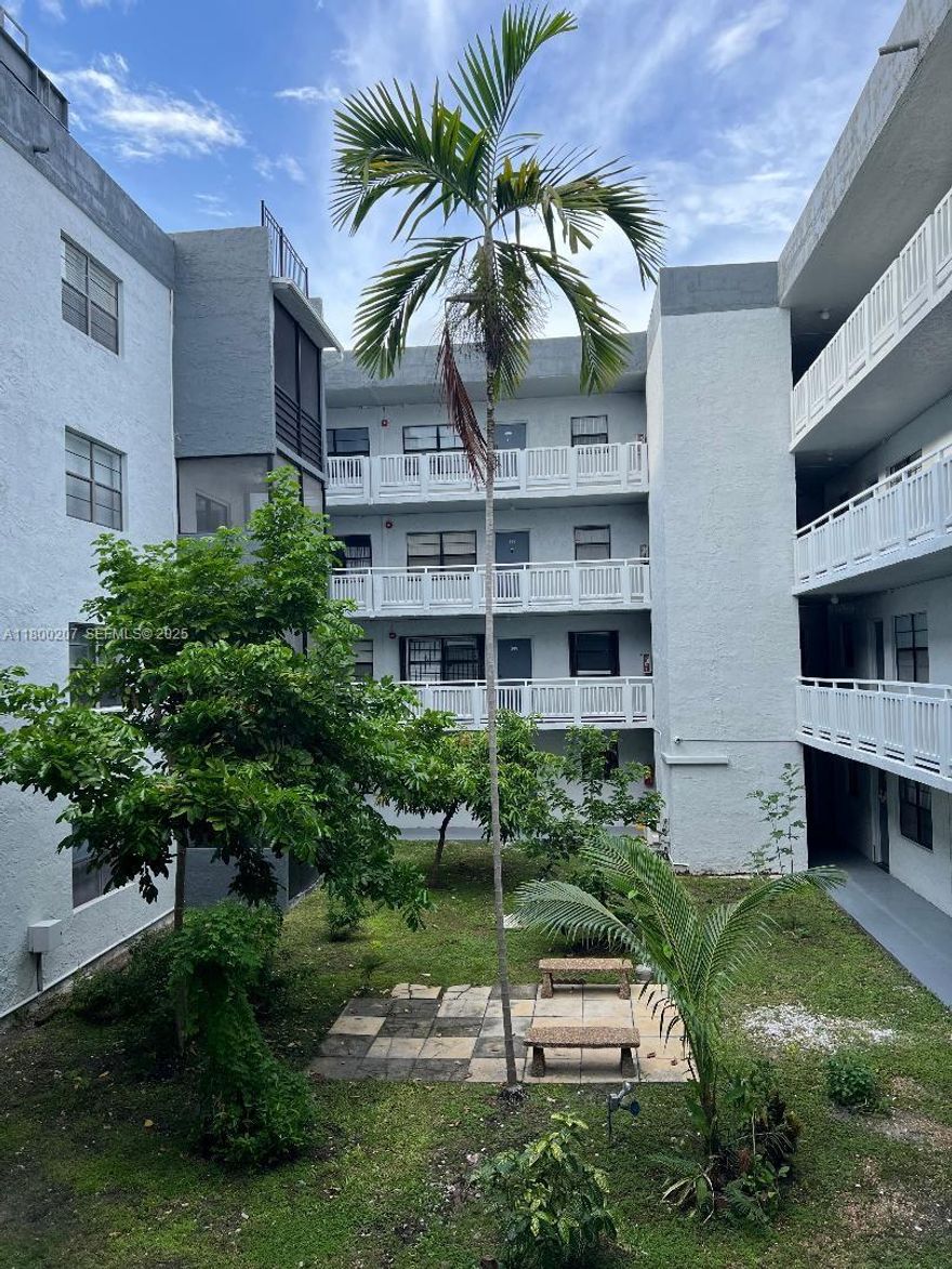 Low Taxes & Low Association Fee!!  Gated Condo 1/1.5, 3 Min. East of I-95,  apprx. 17 min. from Bal Harbor, Haulover Beach, Oleta River State Park and FIU Campus.  Proximity to Biscayne Blvd., US1, nearby shopping, dining & entertainment.  Beautiful 1 bedroom and 1 full bath plus 1/2 bath for guests.  Nicely upgraded kitchen, counter stove, 2025 tile floors, remodeled bathrooms, open layout dinning & living room areas, bldg. w/elevator.  Super spacious main suite has an adjacent nice size balcony to relax, providing more natural light.  Association fee includes Water, Condo Exterior Insurance, Community Pool, Pest Control, etc.. Laundry facility in same floor.  No Dogs allowed, Only 2 cars per unit.  Property Management in lobby area.  There is a 5 yr. rental restriction and after is a great rental.