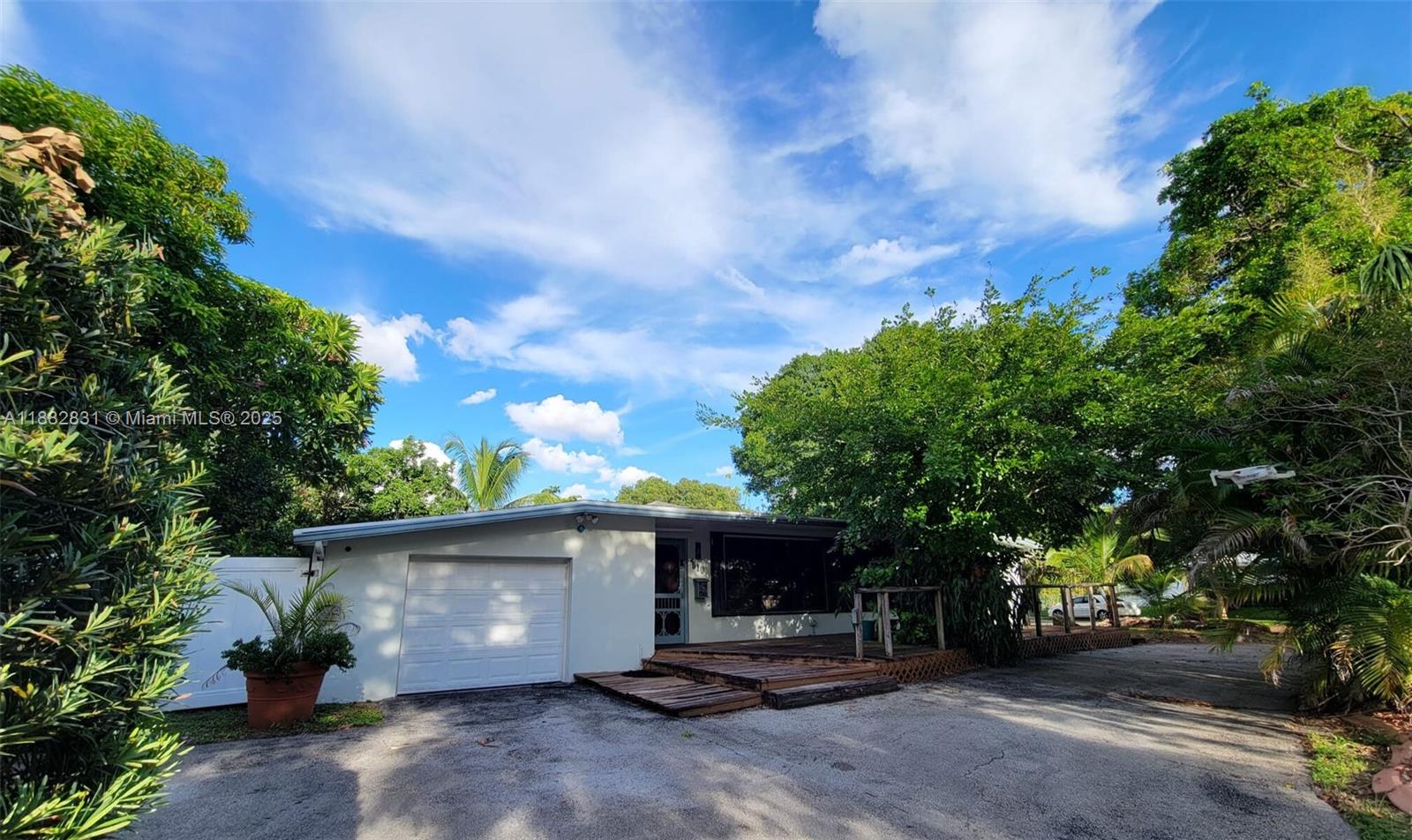 Handyman Special in the Heart of Plantation! Bring your vision to life with this solid 3-bedroom, 2-bath single-family home located in a desirable location. Situated on a spacious corner lot with more than 11,000 sq ft., with no HOA, this property offers endless potential for renovation, or expansion. This is a rare opportunity to customize a home in a well-established community. Perfect for investors, flippers, or savvy buyers looking to build sweat equity. Don’t miss your chance to turn this diamond in the rough into a dream home! Permit Report attached.