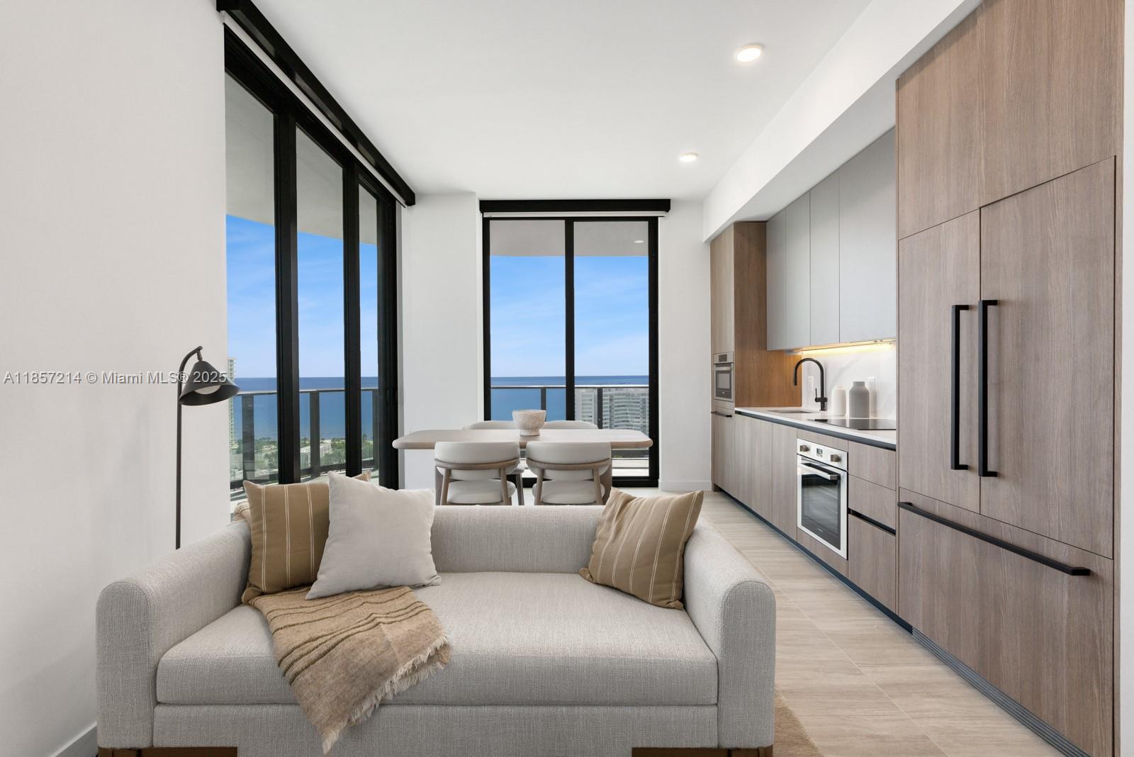 Step Inside With Me! This exceptional 72 Park corner residence has never been lived in and is offered turnkey! Located in a brand new boutique property just 2 blocks from the ocean in Miami Beach with close proximity to Surfside. Filled with natural light through floor-to-ceiling glass windows, the open-concept living feature soaring ceilings and views of the ocean, bay, park, and skyline. This fully furnished 3-bedroom + den home offers contemporary kitchen and bath finishes and a spacious wraparound terrace with sweeping NE views. Amenities include a 150ft pool with cabanas, fitness + yoga, rooftop with panoramic vistas, golf cart beach shuttle, concierge, & smart-building technology. Approved for short-term rentals, it’s ideal as a full-time residence, vacation retreat, or investment.