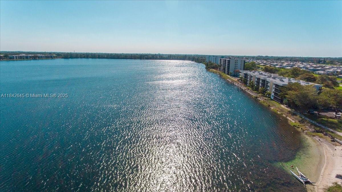 Amazing panoramic lake views in resort style LAKE EMERALD COMMUNITY! Only 5 miles to Fort Lauderdale beach! This gated community is one of a kind. You will love the colorful sunsets while you relax in your spacious private balcony overlooking one of the largest and most beautiful lakes in Florida! This large 2 bedroom, 2 bathroom condo features a large open kitchen, upgraded cabinets, stainless steel appliances, all tile floors, a large master walk-in-closet and much more. Investors can rent right away. Enjoy boating, fishing, swimming, tennis, basketball, gym, sauna, a pool deck cafe, gazebos & an inviting walking trail around the lake! The Club House offers games, pool tables, a dining room & even a library. Close to I-95, the Turnpike, Las Olas Blvd., the beach & Fort Lauderdale airport