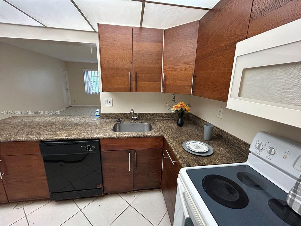 Photo of 4354 NW 9th Ave #14-3D, Deerfield Beach, FL 33064 (MLS # A11776820)