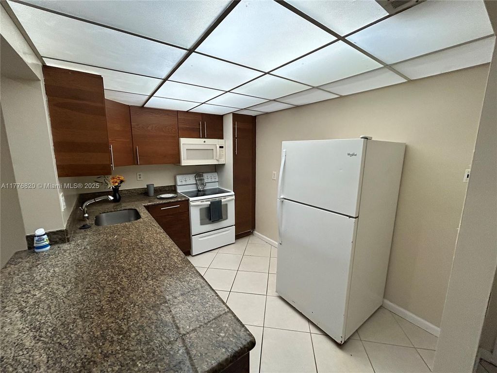 Photo of 4354 NW 9th Ave #14-3D, Deerfield Beach, FL 33064 (MLS # A11776820)