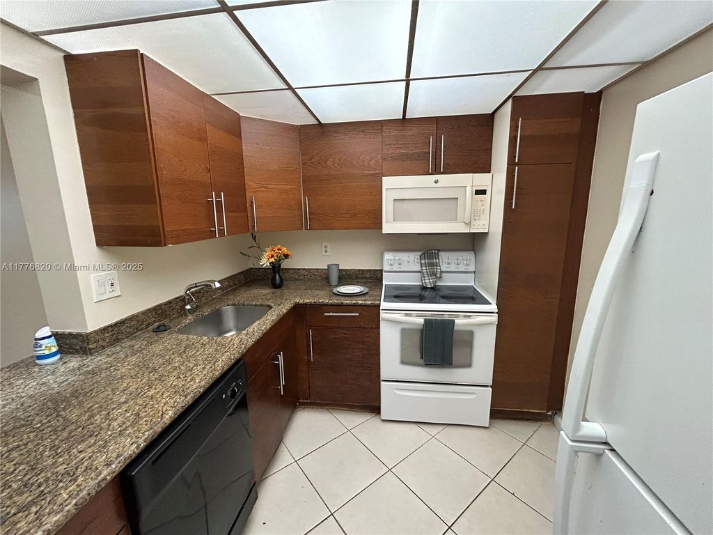 Photo of 4354 NW 9th Ave #14-3D, Deerfield Beach, FL 33064 (MLS # A11776820)