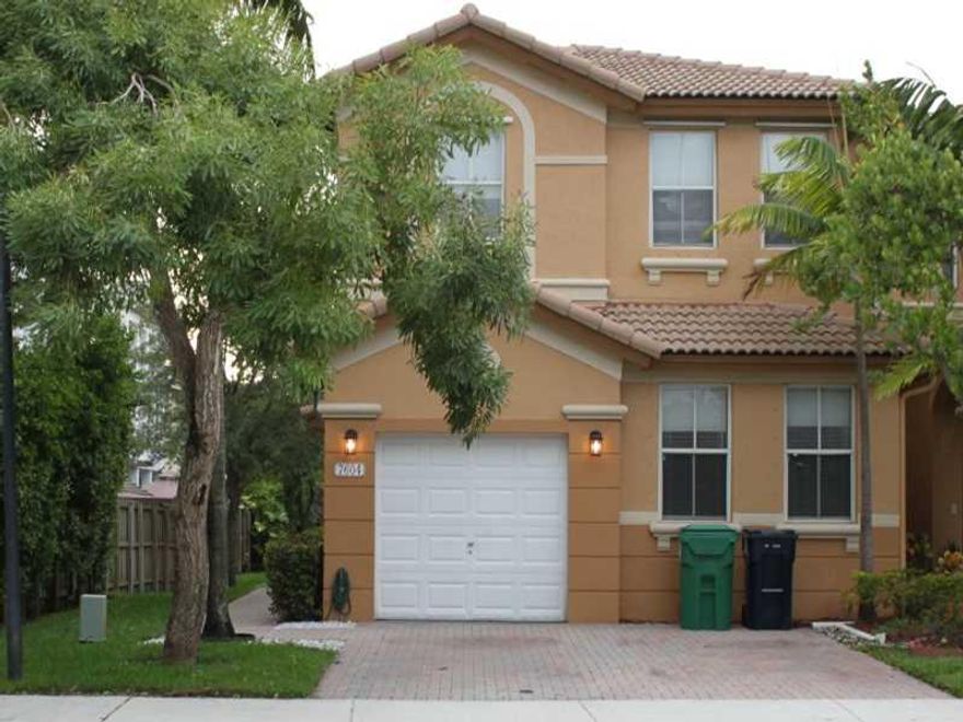 Charming 3 bedroom, 2 1/2 bathroom on a light filled corner lot in the Windward gated community. Walking distance from community pool and additional parking spaces located across the street. Good school district.