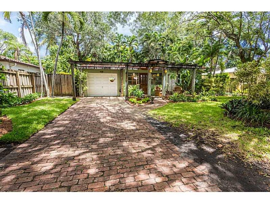 TRUE COCONUT GROVE HOME.  LUSH TROPICAL SETTING ON A PERFECT SCENIC ROLLING STREET.  THIS QUAINT HOME OVERFLOWS WITH CHARACTER AND CHARM  THAT MAKES COCONUT GROVE A SPECIAL PLACE TO CALL HOME.  AS YOU WALK UP TO YOUR NEW HOME THE CHICAGO BRICK DRIVEWAY A ND WALKWAY WILL INVITE AND RELAX YOU WITH A COVERED SHADY PORCH AND AS YOU ENTER THE FRONT DOOR AND WALK INTO THE COSEY FOYER YOUR EYES ARE DRAWN TO THE LUSH TROPICAL BACK YARD WITH PLENTY OF ROOM TO ADD ON A LARGE MASTER BEDROOM SUITE AND FAMILY ROOM.