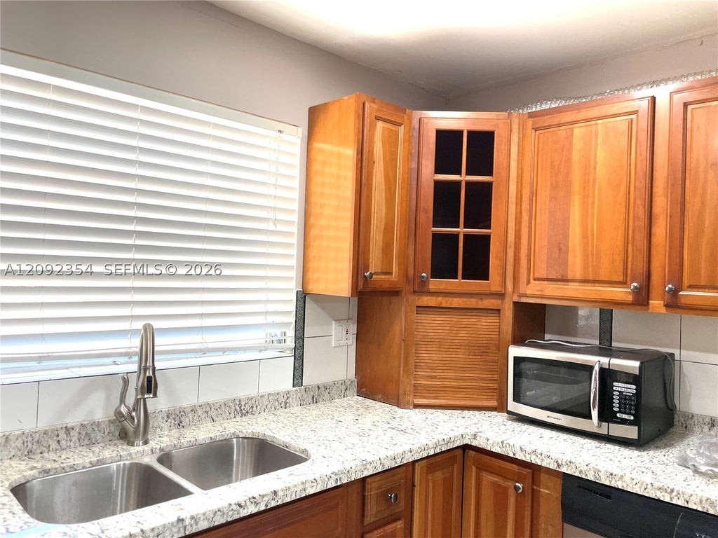 Photo of 7175 Nova Dr #107, Davie, FL 33317 (MLS # A12092354)