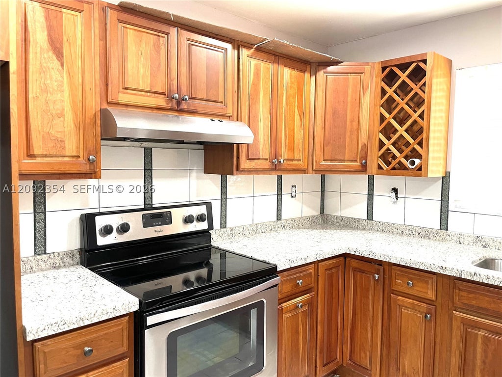 Photo of 7175 Nova Dr #107, Davie, FL 33317 (MLS # A12092354)