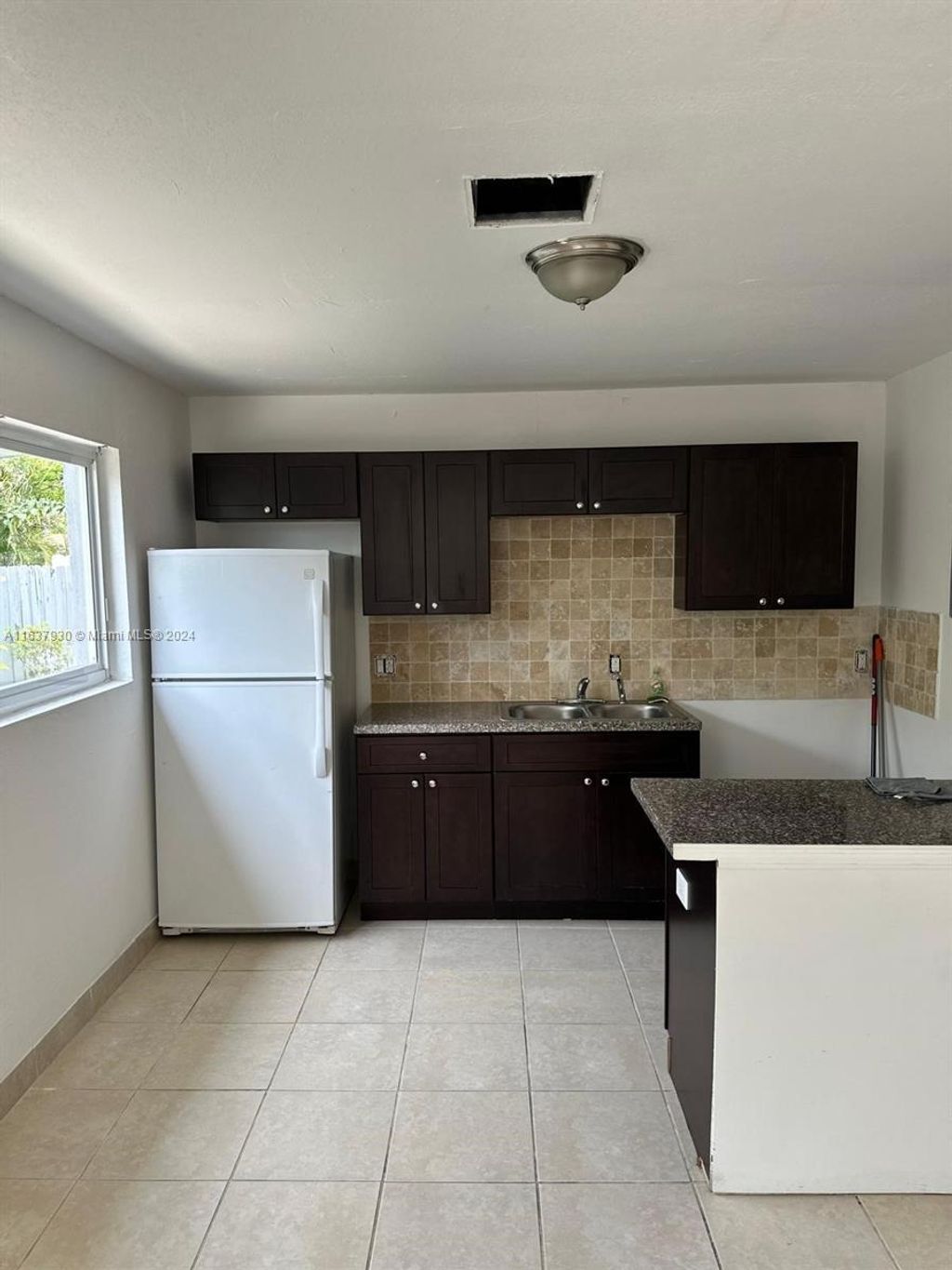 Photo of 542 SW 27th Ter #E, Fort Lauderdale, FL 33312 (MLS # A11637930)