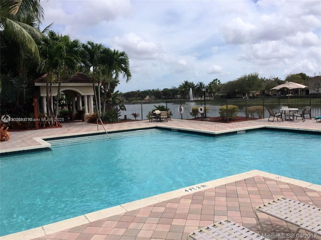 Photo of 2516 Centergate Dr #305, Miramar, FL 33025 (MLS # A11850288)