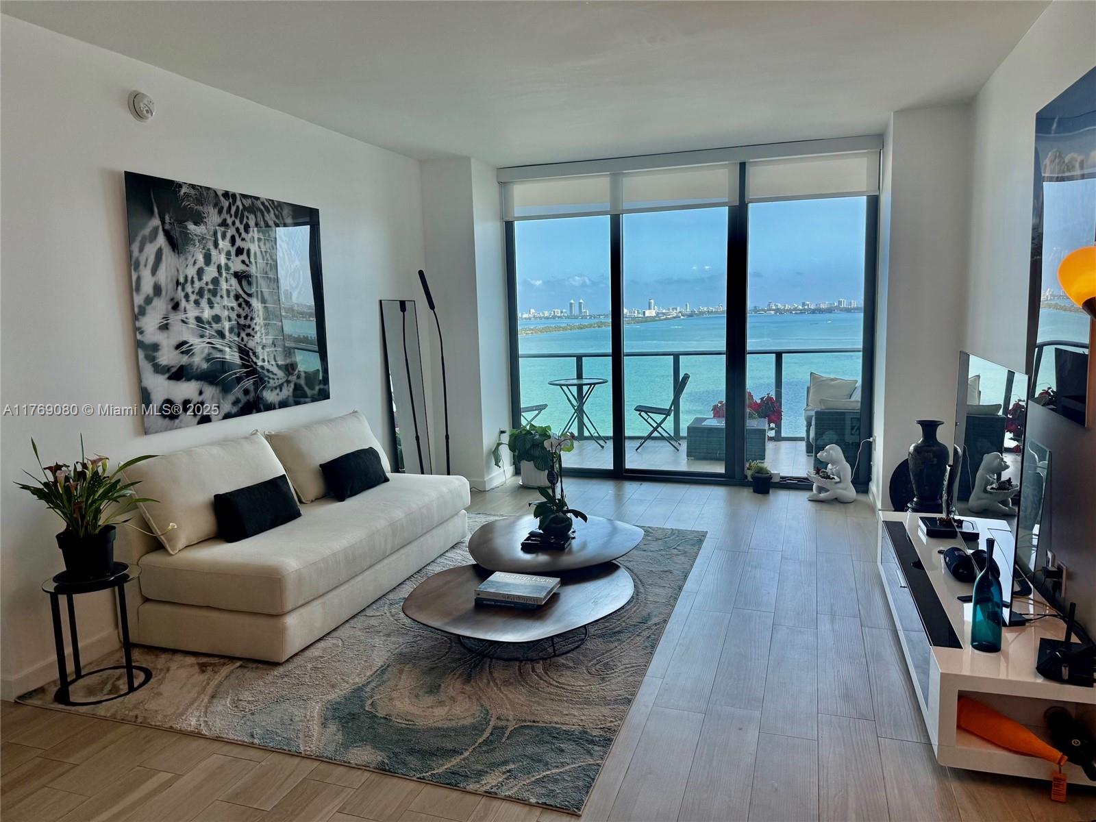 Experience breathtaking views of the bay and Miami Beach from this one-bed plus den, one & half bath condo at Icon Bay in Edgewater. This fully furnished unit is available for a short-term rental, 6 months only, starting on May 1st, 2025. The turnkey unit features elegant porcelain floors and a sophisticated European kitchen for your enjoyment. Stunning views from your 178 sq ft balcony. Residents will have access to the bay-front pool, tennis courts, luxury spa, theater, and newly renovated club rooms and gym. Situated in the heart of Edgewater, just minutes away from Wynwood, Design District, Downtown Miami, and the Beaches, this condo offers the perfect blend of luxury and convenience. Don't miss out on this opportunity to live in one of Miami's most sought-after neighborhoods.