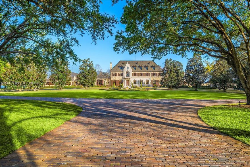 One of the most significant private estates ever built in Florida and the U.S., The Oaks Estate is an extraordinary 87-acre lakefront compound on Lake Thonotosassa, with arrival by seaplane or helicopter. Ideally located 10 min.  to the executive airport and 20 min to Tampa, this authentic French Normandy château offers unmatched scale, privacy, and permanence. A 36-acre stone-walled compound anchors the estate, complemented by a 51-acre greenbelt reserve. Entry begins at a gas lamp–lit guardhouse, leading beneath mature oaks to a grand arrival of fountains and a limestone-clad residence. The 42,782 SF home showcases exceptional craftsmanship in stonework, and millwork, featuring hand-scraped French oak floors in Versailles and herringbone patterns. The grand salon with pillowtop limestone floors, opens through a gallery of 12ft arched mahogany doors to terraces framed by solid limestone columns, an architectural feat rarely seen in residential setings. The culinary wing features bespoke La Cornue Cheateau appliances, a butler’s kitchen, and family room.The Oak Room lounge offers a full service bar, wine storage, limestone fireplace and concealed theater. AWow factors: a 24-car automotive museum with a floating glass boardroom, bowling alley, billiards, cinema, wellness center with gym/spa, hammam/sauna, and indoor saltwater pool. Outdoors: 72' pool, pool house, go-kart circuit, boathouse, 1 mile jogging path, pro-equestrian, and operations comopund with automotive workshop.