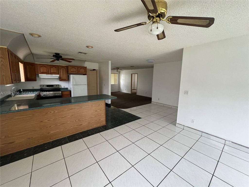 Photo of 5324 Flagler St, Hollywood, FL 33021 (MLS # A12021356)