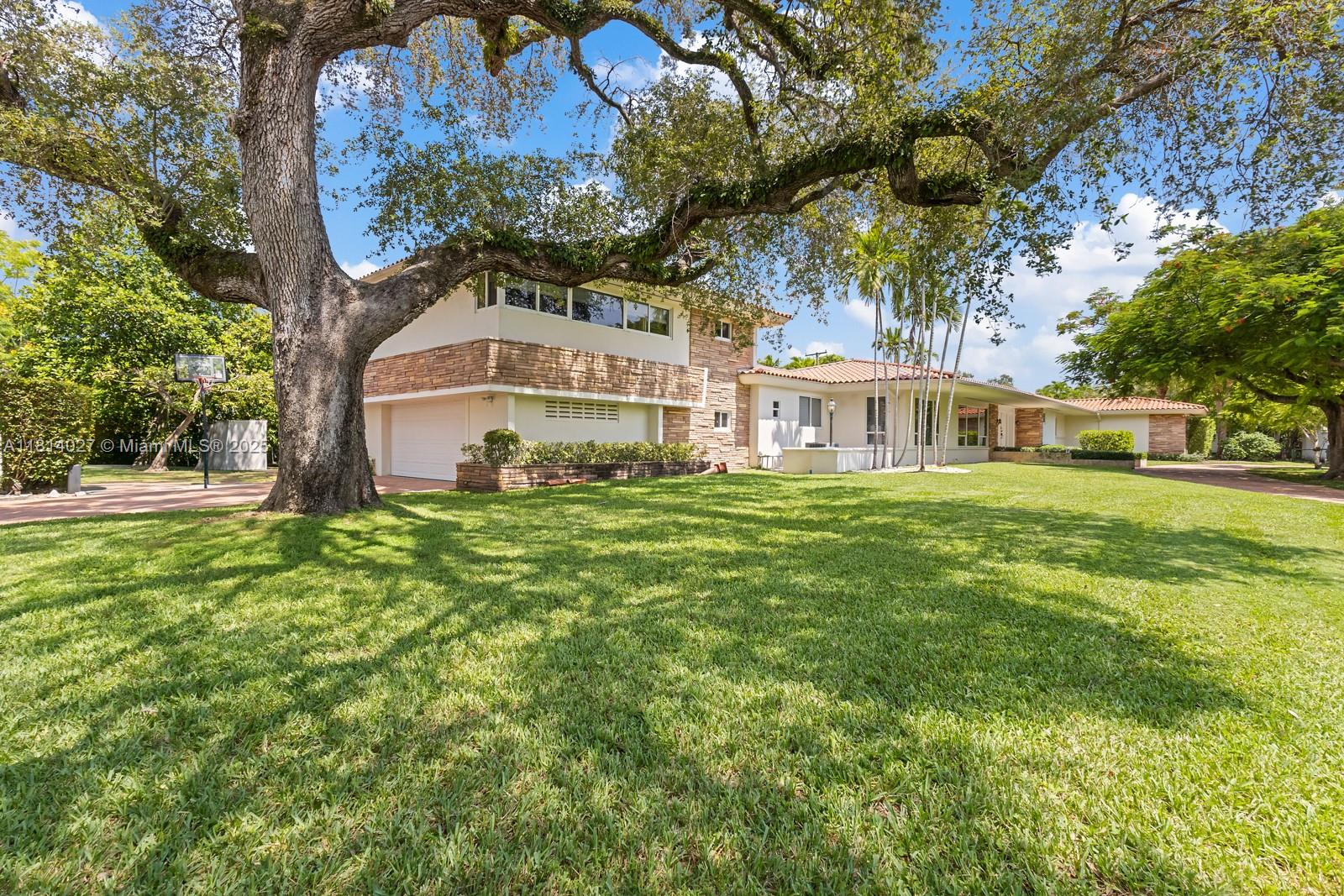 SPACIOUS COCONUT GROVE HOME BOASTS 6 BEDROOMS, 6.5 BATHROOMS, AND SITS ON A HALF-ACRE LOT IN THE DESIRABLE BAY HEIGHTS NEIGHBORHOOD. WITH 24/7 SECURITY PATROL, THIS PROPERTY PROVIDES PEACE OF MIND, LUXURY, CONFORT, SPACE AND SECURITY. THE LARGE BACKYARD FEATURES A FANTASTIC POOL AREA, PERFECT FOR FAMILIES AND THOSE WHO LOVE OUTDOOR LIVING. PROPERTY IS ALSO FULLY FENCED AND OFFERS AMPLE PARKING, INCLUDING A 2-CAR GARAGE. INSIDE THE HOME, YOU'LL FIND A PRIVATE GUEST SUITE COMPLETE WITH A SECOND-FLOOR OFFICE, MAKING IT IDEAL FOR VISITORS OR ANYONE WHO NEEDS A SEPARATE WORKSPACE.THE LOCATION IS UNBEATABLE AS THE PROPERTY IS WALKING DISTANCE TO THE ICONIC VIZCAYA MUSEUM AND GARDENS, A POPULAR CULTURAL LANDMARK IN MIAMI. THIS HOME HAS IT ALL: LUXURY, SPACE, COMFORT, CONVENIENCE & SECURITY