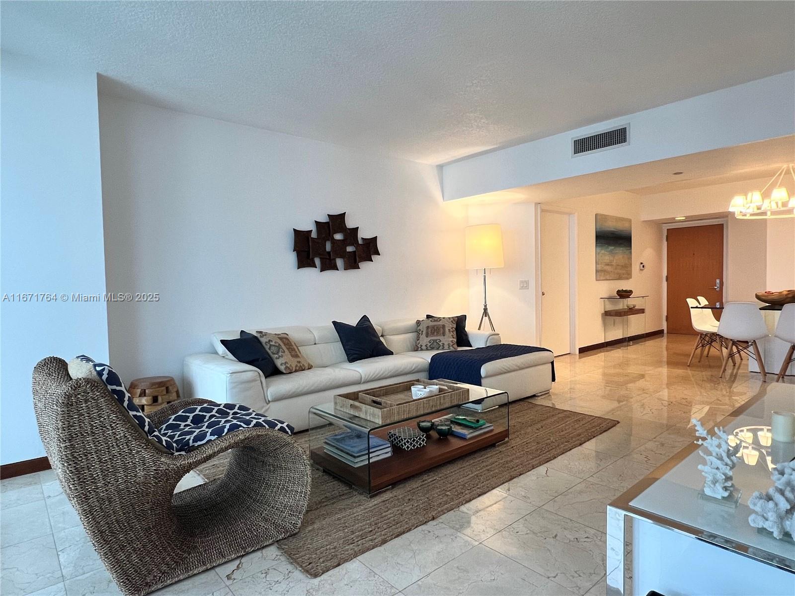 This stunning 2-bed, 2-baths + den residence offers breathtaking Intracoastal & ocean views from every room. Well equipped, impeccably maintained, and tastefully decorated, it creates an inviting atmosphere with bright, spacious interiors, a split-bedroom layout & marble floors throughout. 1 King-size bed, 1 queen, 1 full & 1 twin. Enjoy resort-style amenities that include 3 pools, 4 tennis courts, a world-class spa, a state-of-the-art fitness center, a beauty salon, a clubhouse, and outdoor café. Valet service or self-parking. BBQ area, kids' playground, and 24-hr security.Walk to Waterways Marina and Shoppes, Close to Whole Foods, Target, Best Buy, grocery stores, Aventura Mall, a golf course, and the marina. Indulge in the resort-like lifestyle of Aventura's South Tower! Seasonal only.