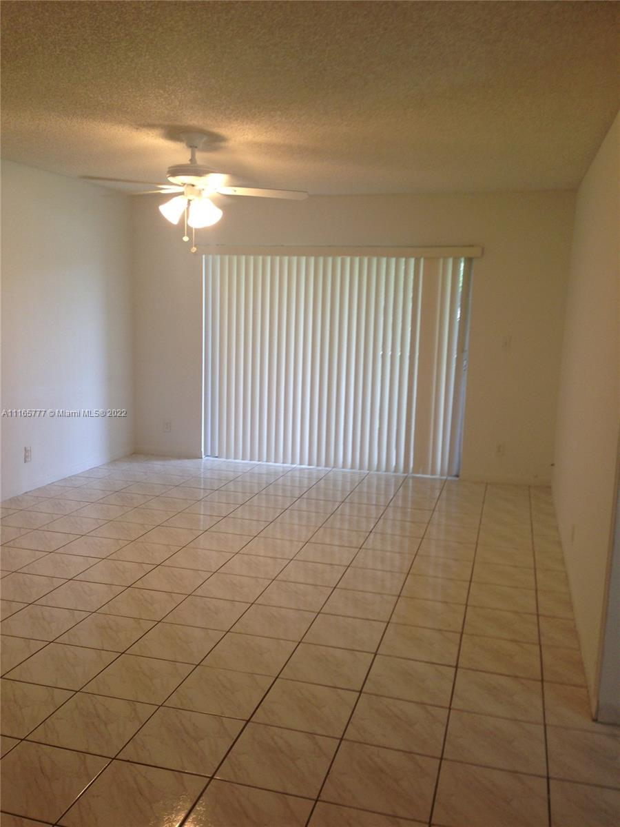 Perfect location in Coral Springs, close to main roads. Spacious 2 bedroom unit and 1 bathroom. Tile throughout and Laminated flooring on bedroom. NO age restrictions. A Schools. Washer and dryer in unit. ASSIGNED Parking Space and plenty of Guest Parking. Community has Pools, Fitness Center, Game room, Sauna, Jacuzzi, Steam room.